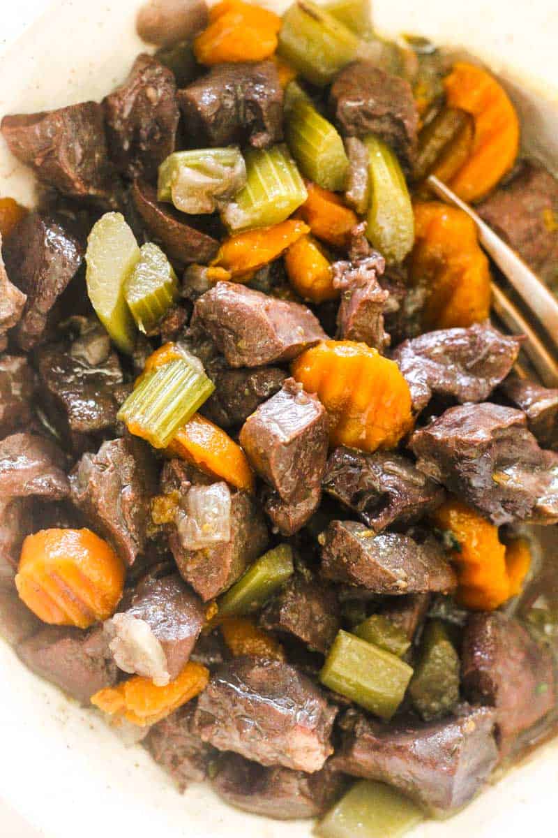 braised pork heart with chopped celery and carrots