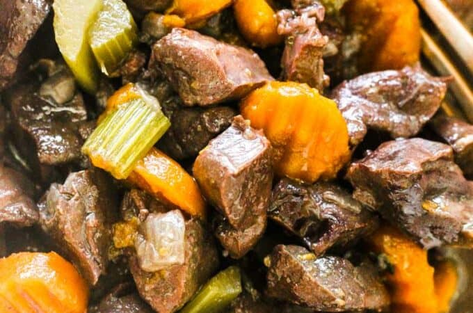 braised pork heart stew with celery and carrots, close picture