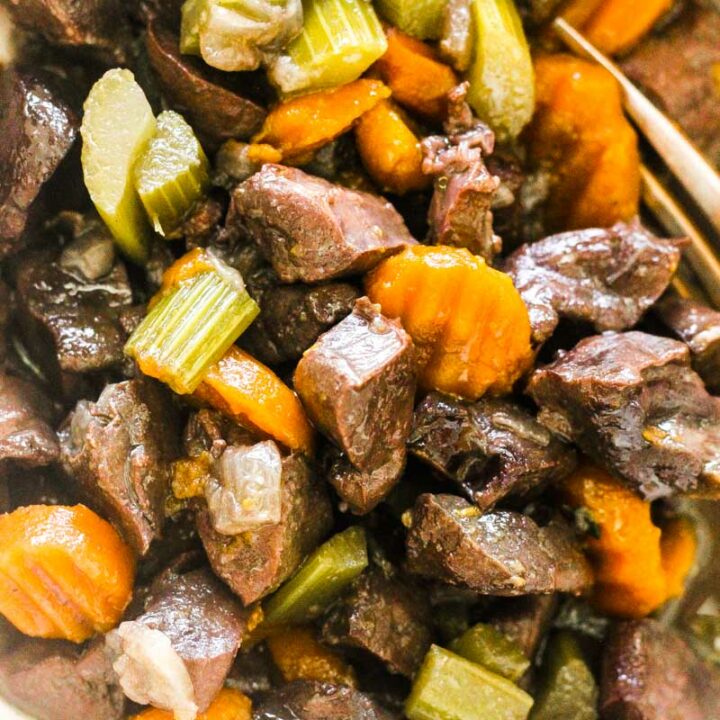 braised pork heart stew with celery and carrots, close picture