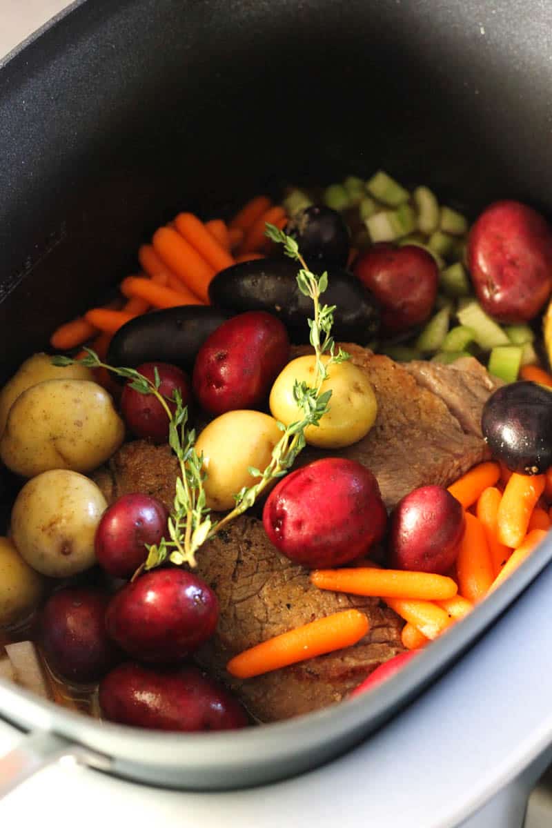beef pot roast in possible cooker before cooking