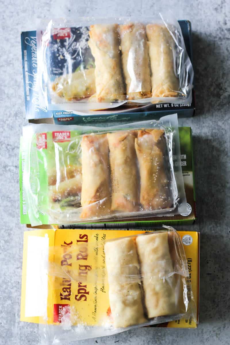 packages with open bag of spring rolls