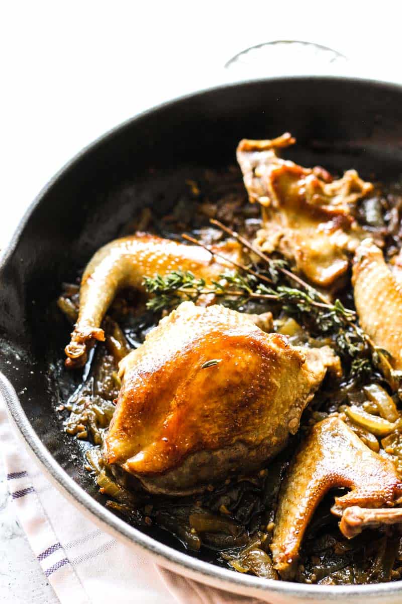 roasted squab in the pan with thyme