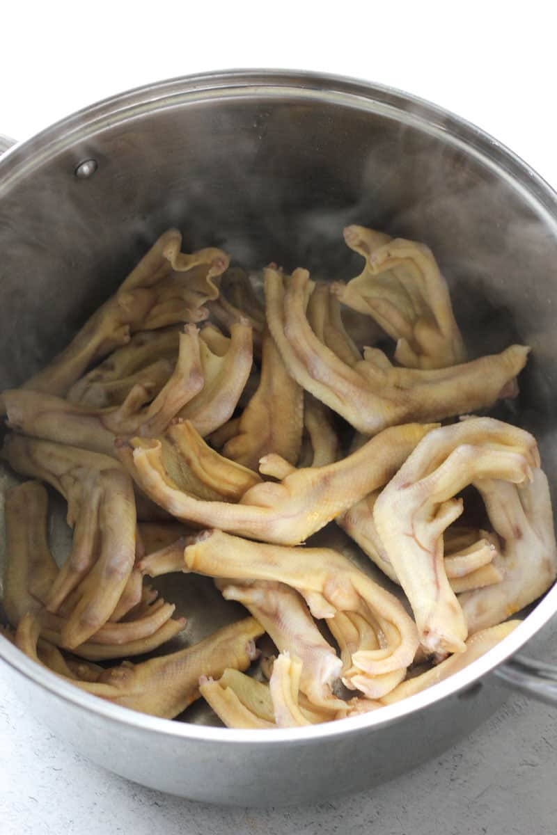 steamy duck feet in the large pot