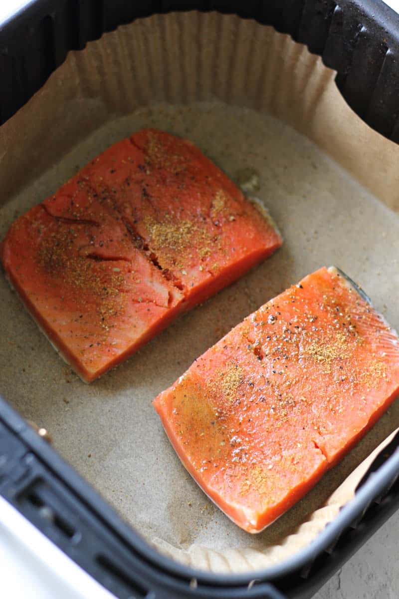 old bay seasoning on top of salmon fillets in air fryer