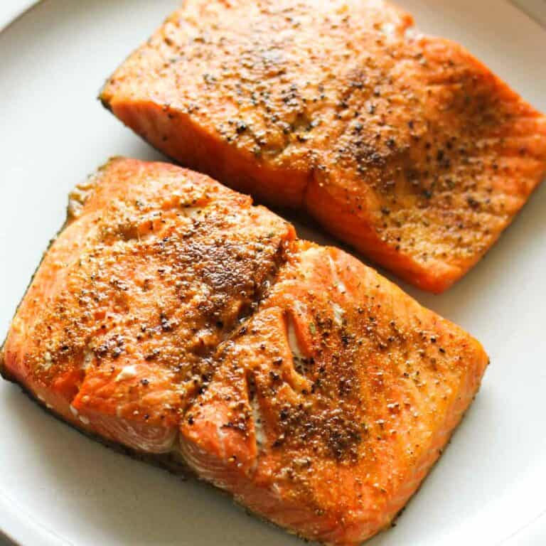 air fryer salmon with old bay seasoning on top