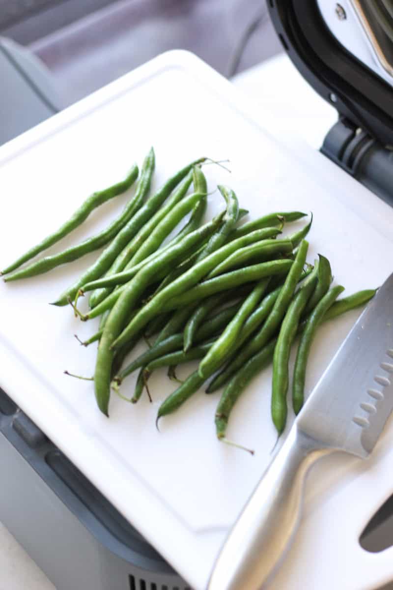 fresh green beans on the cutting board