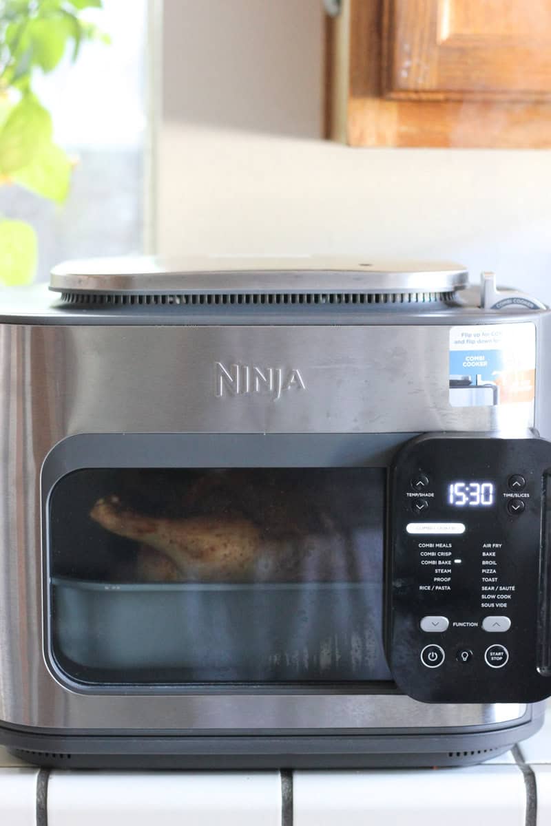 ninja combi with chicken inside on the table