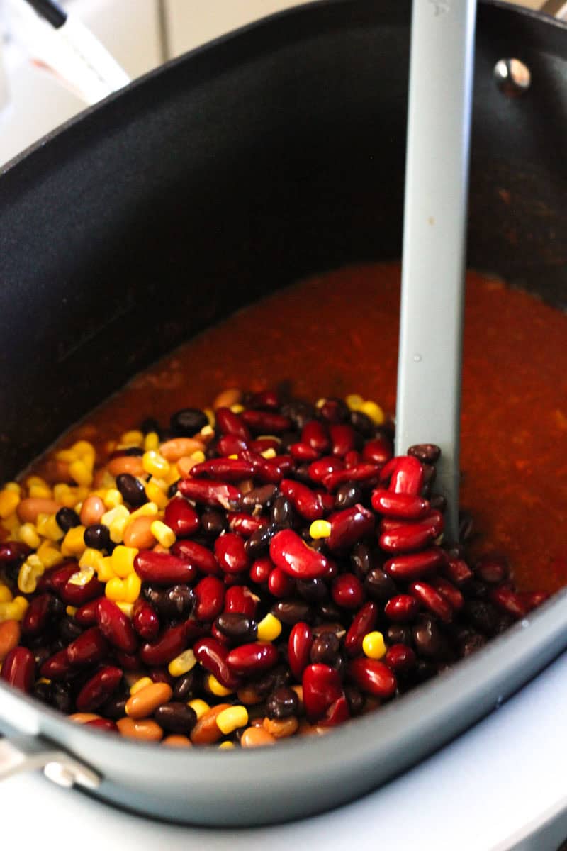 beans in the pot full of tomato sauce