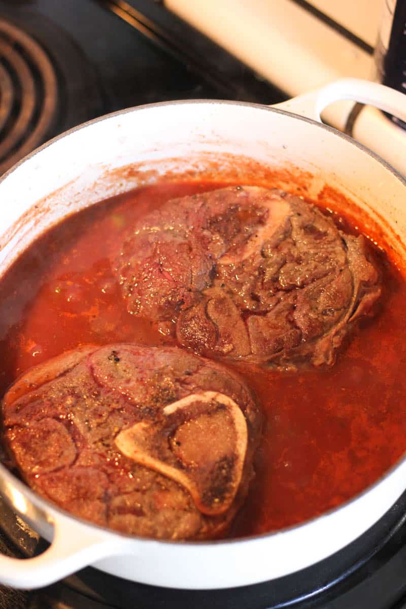 cooking bison osso bucco in the pot