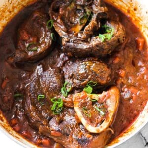 bison osso buco with chopped green onions