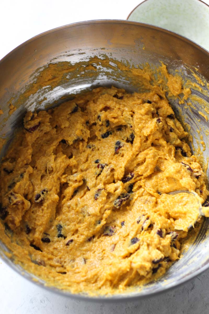 pumpkin fruitcake with pineapple batter in the metal bowl