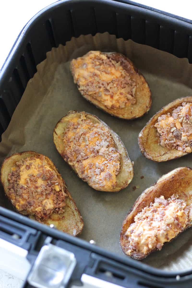 raw uncooked loaded potato skins in the air fryer