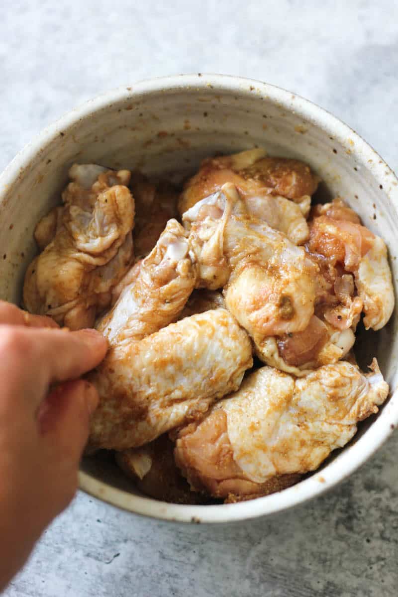 marinated chicken wings in the bowl