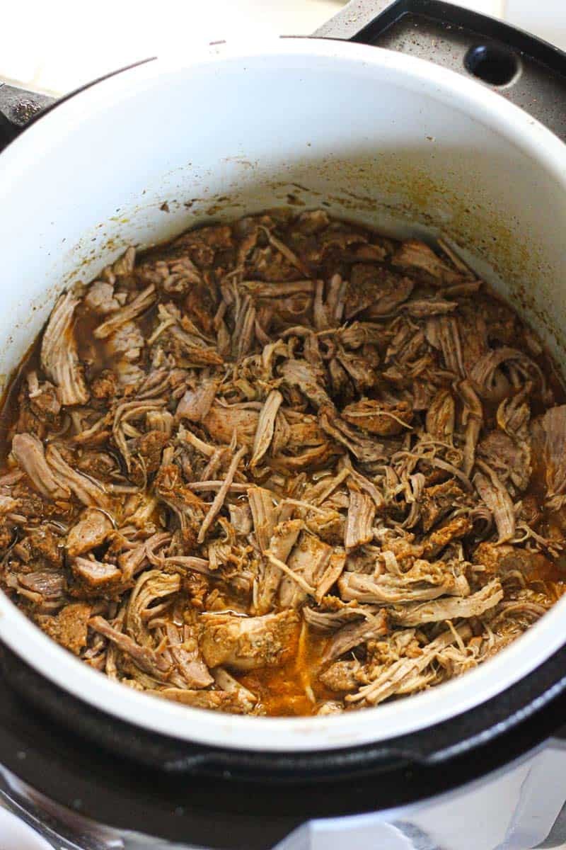 Tender shredded beef in slow cooker, perfect for sandwiches or tacos.